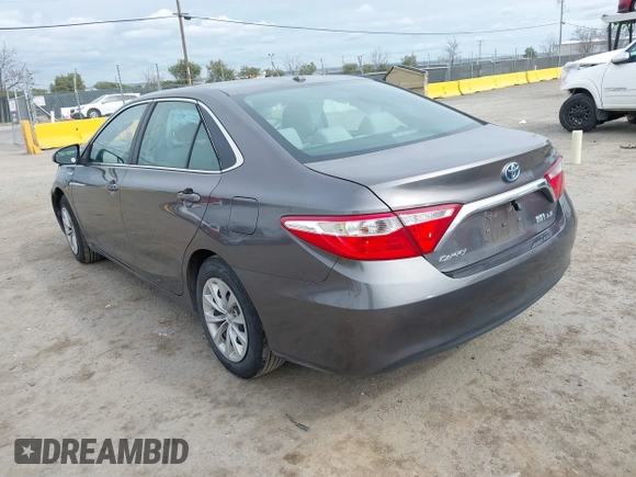 2017 Toyota Camry Hybrid LE with VIN 4T1BD1FK9HU216117, listed as a IAAI auction lot 41710989 with 99,595 mi miles. Bid and sale history available at carsss.com. Image 3.