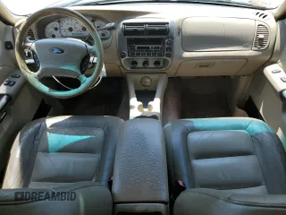 2003 Ford Explorer Sport XLS z VIN 1FMYU60E53UA78241, wystawiony jako Copart lot #54566005 z przebiegiem 187 731 mil mil oraz Szkody całkowita. Historia ofert i sprzedaży dostępna na DreamBid. Obrazek 8.