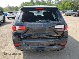 2019 Jeep Grand Cherokee Trailhawk with VIN 1C4RJFLG6KC838275, listed as a Copart auction lot 53002185 with 77,597 mi miles and Salvage title. Bid and sale history available at DreamBid. Image 6.