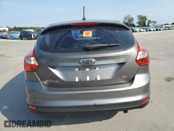 2012 Ford Focus SE z VIN 1FAHP3K28CL298448, wystawiony jako Copart lot #57852505 z przebiegiem 163 707 mil mil oraz Szkody całkowita. Historia ofert i sprzedaży dostępna na DreamBid. Obrazek 6.