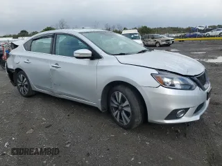 2018 Nissan Sentra S with VIN 3N1AB7AP7JY340968, listed as a Copart auction lot 52147045 with 113,547 mi miles and Salvage Title. Bid and sale history available at DreamBid. Image 4.