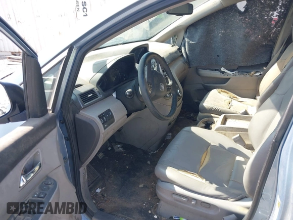 2014 Honda Odyssey EX-L with VIN 5FNRL5H65EB103900, listed as a IAAI auction lot 42592359 with 53,276 mi miles and . Bid and sale history available at DreamBid. Image 5.
