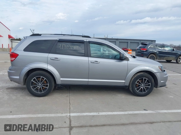 2018 Dodge Journey SE with VIN 3C4PDCABXJT295391, listed as a IAAI auction lot 41707149 with 134,221 mi miles. Bid and sale history available at carsss.com. Image 14.