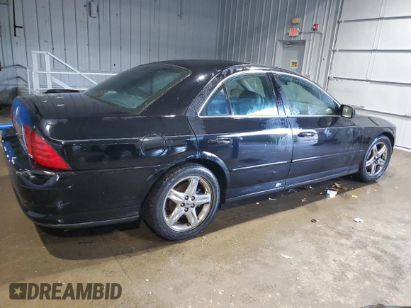2002 Lincoln LS w/Base Pkg with VIN 1LNHM87A52Y714212, listed as a Copart auction lot 84810774 with 68,413 mi miles and Salvage Title. Bid and sale history available at DreamBid. Image 3.