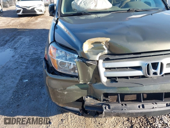 2006 Honda Pilot EX-L with VIN 5FNYF28546B002907, listed as a IAAI auction lot 41650042 with 272,069 mi miles and . Bid and sale history available at DreamBid. Image 14.