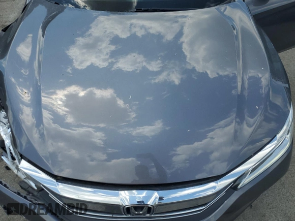 2016 Honda Accord Touring z VIN 1HGCR3F94GA020011, wystawiony jako Copart lot #56228415 z przebiegiem 85 941 mil mil oraz Szkoda całkowita • Salvage title. Historia ofert i sprzedaży dostępna na DreamBid. Obrazek 11.