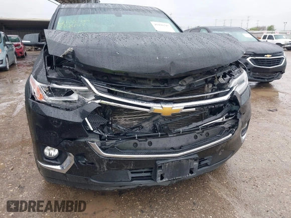 2018 Chevrolet Traverse LT Cloth with VIN 1GNERGKW3JJ199442, listed as a IAAI auction lot 41896347 with 74,806 mi miles and . Bid and sale history available at DreamBid. Image 6.