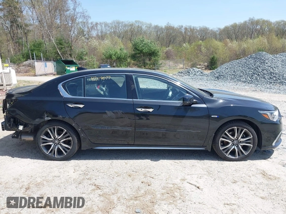 2018 Acura RLX Hybrid Sport z VIN JH4KC2F9XJC000524, wystawiony jako IAAI lot #42119077 z przebiegiem 60 381 mil mil oraz . Historia ofert i sprzedaży dostępna na DreamBid. Obrazek 14.