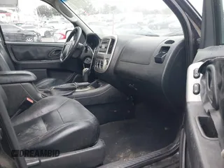 2005 Ford Escape Limited z VIN 1FMYU04155KC05430, wystawiony jako IAAI lot #41784958 z przebiegiem 190 822 mil mil oraz . Historia ofert i sprzedaży dostępna na DreamBid. Obrazek 5.