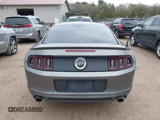 2013 Ford Mustang GT with VIN 1ZVBP8CF1D5261761, listed as a IAAI auction lot 42173607 with 76,658 mi miles and . Bid and sale history available at DreamBid. Image 16.