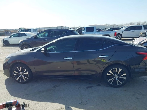 2016 Nissan Maxima 3.5 Platinum with VIN 1N4AA6AP2GC385723, listed as a IAAI auction lot 41753328 with 162,845 mi miles. Bid and sale history available at carsss.com. Image 14.