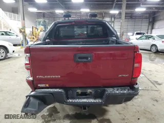 2021 Chevrolet Colorado 4WD ZR2 with VIN 1GCGTEEN1M1112569, listed as a Copart auction lot 45168895 with 70,775 mi miles and Salvage Title. Bid and sale history available at carsss.com. Image 6.