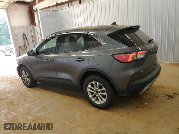 2022 Ford Escape SE with VIN 1FMCU9G66NUA73563, listed as a Copart auction lot 61997355 with 59,077 mi miles and Clean title. Bid and sale history available at DreamBid. Image 2.