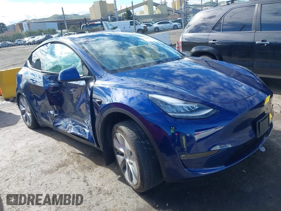 2022 Tesla Model Y Long Range with VIN 7SAYGDEE6NF318372, listed as a IAAI auction lot 41526857 with 26,083 mi miles and . Bid and sale history available at carsss.com. Image 1.