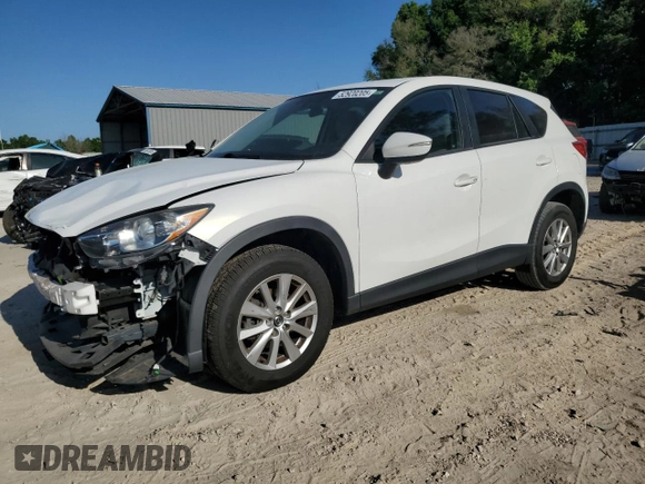 2015 Mazda CX-5 Touring with VIN JM3KE2CY1F0538116, listed as a Copart auction lot 52920205 with 176,476 mi miles and Salvage Title. Bid and sale history available at carsss.com. Image 1.