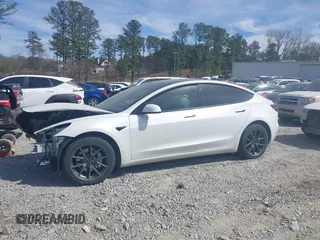 2022 Tesla Model 3 Long Range with VIN 5YJ3E1EB0NF106570, listed as a IAAI auction lot 41832622 with 52,679 mi miles and . Bid and sale history available at DreamBid. Image 14.