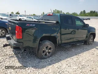 2015 Chevrolet Colorado 4WD Z71 with VIN 1GCGTCE35F1149677, listed as a Copart auction lot 64271015 with 39,671 mi miles and Clean title. Bid and sale history available at DreamBid. Image 3.