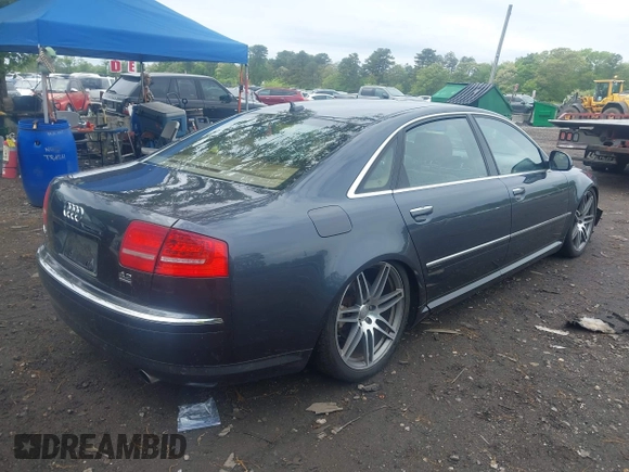 2009 Audi A8 4.2L z VIN WAUMV94E19N000406, wystawiony jako IAAI lot #42264086 z przebiegiem 145 992 mil mil oraz . Historia ofert i sprzedaży dostępna na DreamBid. Obrazek 4.