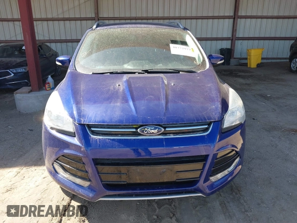 2016 Ford Escape Titanium with VIN 1FMCU9JXXGUB58961, listed as a IAAI auction lot 41772977 with 122,665 mi miles. Bid and sale history available at carsss.com. Image 12.
