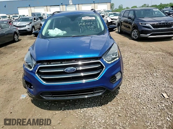 2019 Ford Escape Titanium z VIN 1FMCU9J99KUB39487, wystawiony jako Copart lot #60424765 z przebiegiem 43 094 mil mil oraz Szkoda całkowita • Salvage title. Historia ofert i sprzedaży dostępna na DreamBid. Obrazek 13.