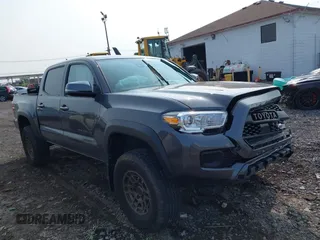 2023 Toyota Tacoma SR with VIN 3TYCZ5ANXPT150235, listed as a IAAI auction lot 42390219 with 18,714 mi miles and . Bid and sale history available at DreamBid. Image 1.