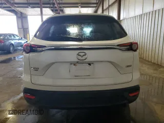 2019 Mazda CX-9 Touring with VIN JM3TCBCY3K0317900, listed as a Copart auction lot 64180945 with 63,721 mi miles and Salvage title. Bid and sale history available at DreamBid. Image 6.
