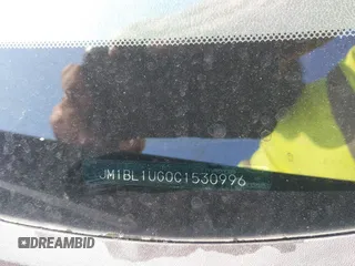2012 Mazda 3 i Sport z VIN JM1BL1UG0C1530996, wystawiony jako IAAI lot #41987191 z przebiegiem 174 144 mil mil oraz . Historia ofert i sprzedaży dostępna na DreamBid. Obrazek 9.
