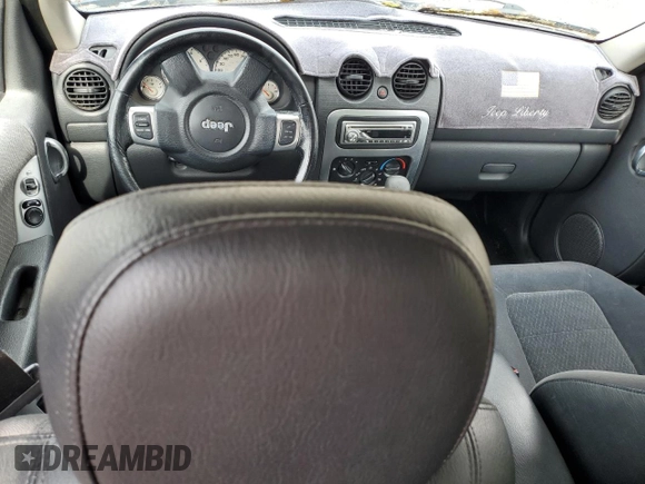 2002 Jeep Liberty Limited with VIN 1J4GL58K52W213948, listed as a Copart auction lot 60555885 with 96,415 mi miles and Salvage title. Bid and sale history available at DreamBid. Image 8.