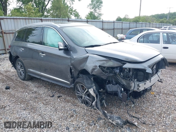 2020 Infiniti QX60 Pure with VIN 5N1DL0MM2LC517417, listed as a IAAI auction lot 42240908 with 52,022 mi miles and . Bid and sale history available at DreamBid. Image 1.