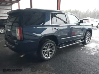 2018 GMC Yukon Denali with VIN 1GKS2CKJ5JR335718, listed as a IAAI auction lot 40991126 with 87,479 mi miles. Bid and sale history available at carsss.com. Image 4.