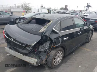 2015 Nissan Sentra S with VIN 3N1AB7AP9FY267724, listed as a IAAI auction lot 41488999 with Not Provided miles and . Bid and sale history available at DreamBid. Image 6.