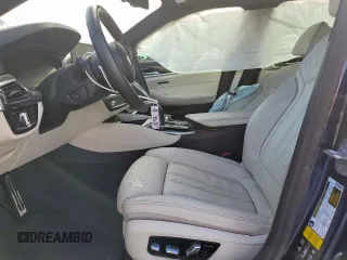 2020 BMW 5 Series M550i xDrive with VIN WBAJS7C09LCE06865, listed as a Copart auction lot 60140955 with Not provided miles and Salvage title. Bid and sale history available at DreamBid. Image 7.