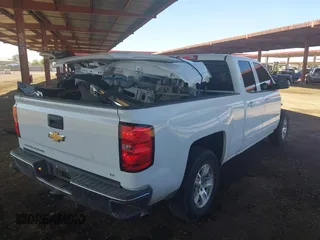 2015 Chevrolet Silverado 1500 LT with VIN 1GCRCREC6FZ423241, listed as a IAAI auction lot 40707309 with 114,778 mi miles. Bid and sale history available at carsss.com. Image 4.