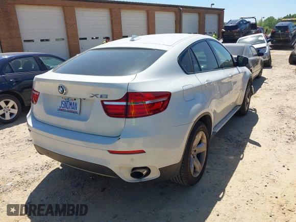 2014 BMW X6 xDrive35i with VIN 5UXFG2C53E0C44047, listed as a IAAI auction lot 42057685 with 145,912 mi miles. Bid and sale history available at carsss.com. Image 4.