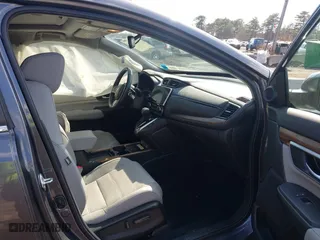 2021 Honda CR-V Touring with VIN 2HKRW2H9XMH645901, listed as a IAAI auction lot 41870446 with 22,996 mi miles. Bid and sale history available at carsss.com. Image 5.