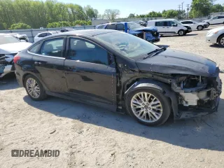 2017 Ford Focus Titanium with VIN 1FADP3J21HL260065, listed as a Copart auction lot 53165945 with 110,540 mi miles and Salvage title. Bid and sale history available at DreamBid. Image 4.