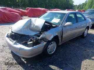 2001 Toyota Camry CE z VIN 4T1BG22K01U053432, wystawiony jako IAAI lot #42257822 z przebiegiem 128 610 mil mil oraz . Historia ofert i sprzedaży dostępna na DreamBid. Obrazek 20.