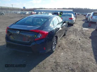2016 Honda Civic Sedan EX with VIN 2HGFC2F74GH511641, listed as a IAAI auction lot 41843523 with 138,289 mi miles. Bid and sale history available at carsss.com. Image 4.