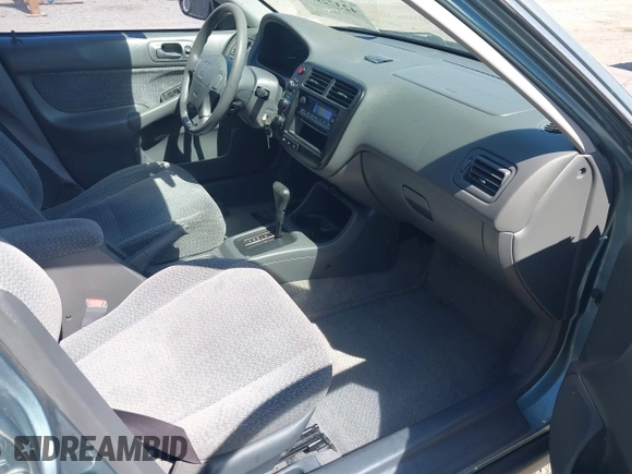 1999 Honda Civic LX z VIN 2HGEJ667XXH575496, wystawiony jako IAAI lot #42372107 z przebiegiem 175 154 mil mil oraz . Historia ofert i sprzedaży dostępna na DreamBid. Obrazek 5.