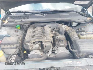 2005 Chrysler 300 with VIN 2C3AA53G55H186617, listed as a IAAI auction lot 42004943 with 230,956 mi miles. Bid and sale history available at carsss.com. Image 10.