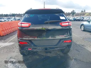 2015 Jeep Cherokee Trailhawk with VIN 1C4PJMBS7FW699392, listed as a IAAI auction lot 41797617 with 1 mi miles. Bid and sale history available at carsss.com. Image 16.