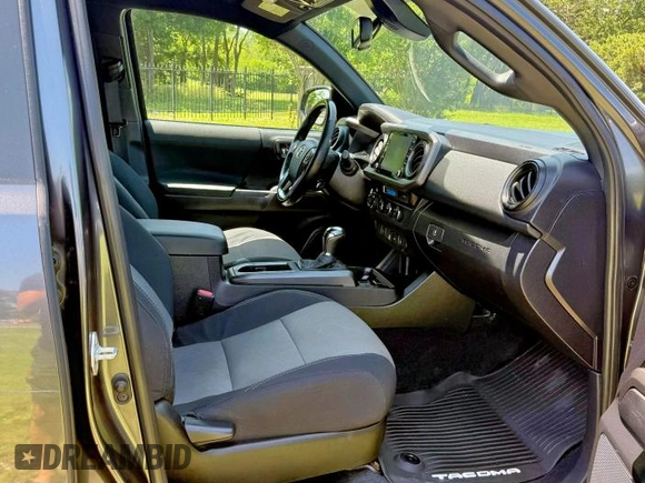 2021 Toyota Tacoma SR с VIN 3TMCZ5AN3MM441215, выставлен на аукционе Copart как лот 64744385 с пробегом 30 503 миль миль и Списание • Salvage title. История ставок и продаж доступна на DreamBid. Изображение 5.
