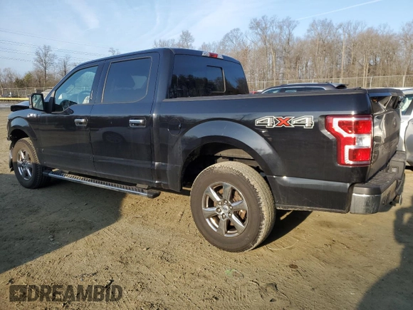 2020 Ford F-150 XL with VIN 1FTEW1EP8LFC00965, listed as a Copart auction lot 42652045 with 92,000 mi miles and Salvage Title. Bid and sale history available at carsss.com. Image 2.