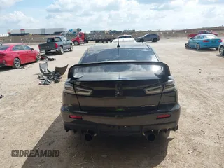 2015 Mitsubishi Lancer Evolution GSR z VIN JA32W8FV2FU020047, wystawiony jako IAAI lot #41890897 z przebiegiem 121 089 mil mil oraz . Historia ofert i sprzedaży dostępna na DreamBid. Obrazek 17.