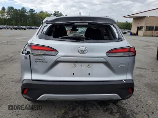 2022 Toyota Corolla Cross XLE with VIN 7MUDAABG2NV009663, listed as a Copart auction lot 55945735 with 59,473 mi miles and Salvage title. Bid and sale history available at DreamBid. Image 6.