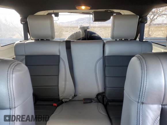 2007 Jeep Wrangler Unlimited Sahara with VIN 1J4GB59197L144781, listed as a Copart auction lot 48678315 with 137,538 mi miles and Salvage title. Bid and sale history available at DreamBid. Image 10.