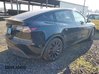 2021 Tesla Model Y Performance with VIN 5YJYGDEF9MF240125, listed as a Copart auction lot 88495425 with 45,829 mi miles and Salvage Title. Bid and sale history available at DreamBid. Image 3.