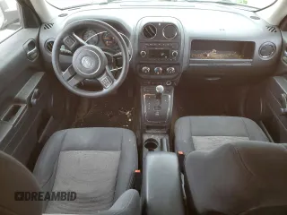 2014 Jeep Patriot Altitude with VIN 1C4NJPBA4ED911496, listed as a Copart auction lot 52390435 with 125,114 mi miles and Salvage Title. Bid and sale history available at DreamBid. Image 8.