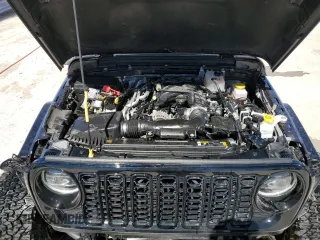 2024 Jeep Wrangler Willys with VIN 1C4RJXDG9RW286042, listed as a Copart auction lot 49459025 with 6,417 mi miles and Salvage title. Bid and sale history available at DreamBid. Image 12.