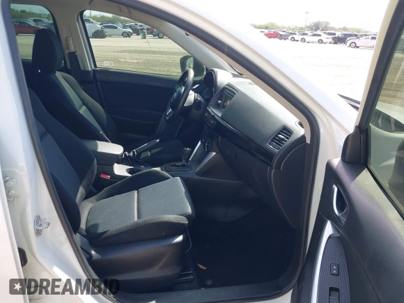 2013 Mazda CX-5 Sport z VIN JM3KE2BE5D0135213, wystawiony jako IAAI lot #42270730 z przebiegiem 140 917 mil mil oraz . Historia ofert i sprzedaży dostępna na DreamBid. Obrazek 5.